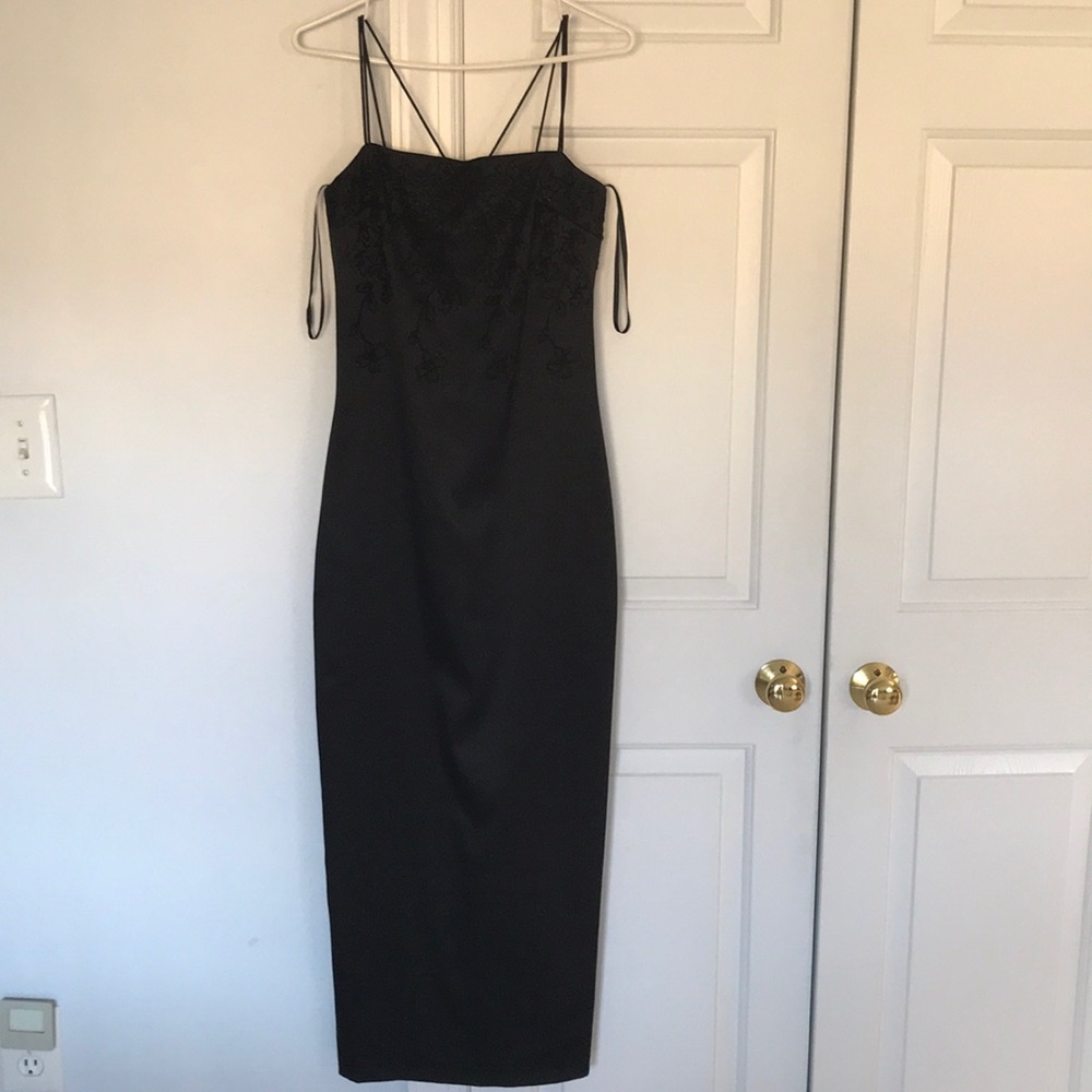 Black formal gown with beaded neckline